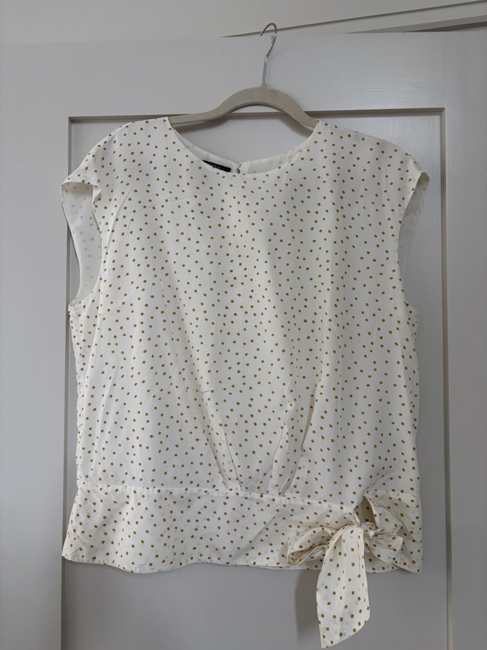 Sleeveless Cream Dot Tie-Hem Blouse